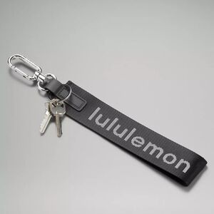 Lululemon Never Lost Keychain NWT Neutral Black/White